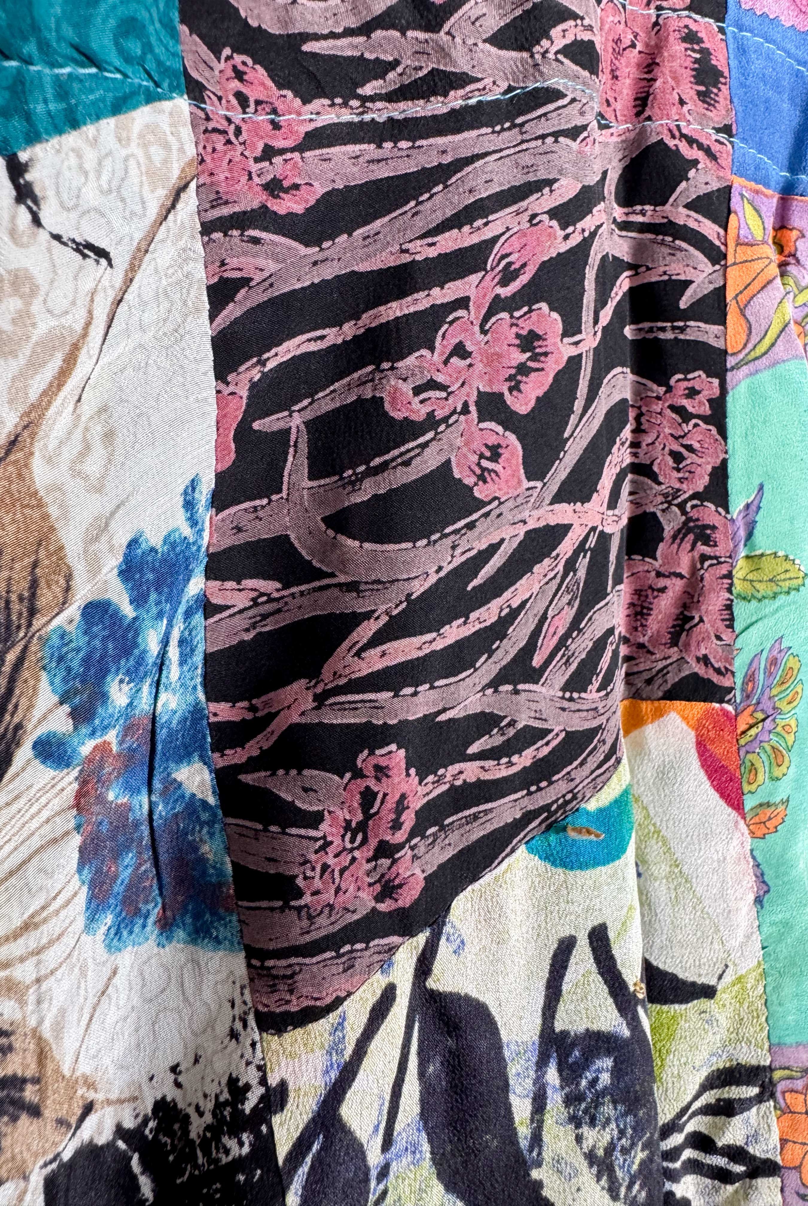 Close-up of a colorful patchwork - Love Protect Sustain