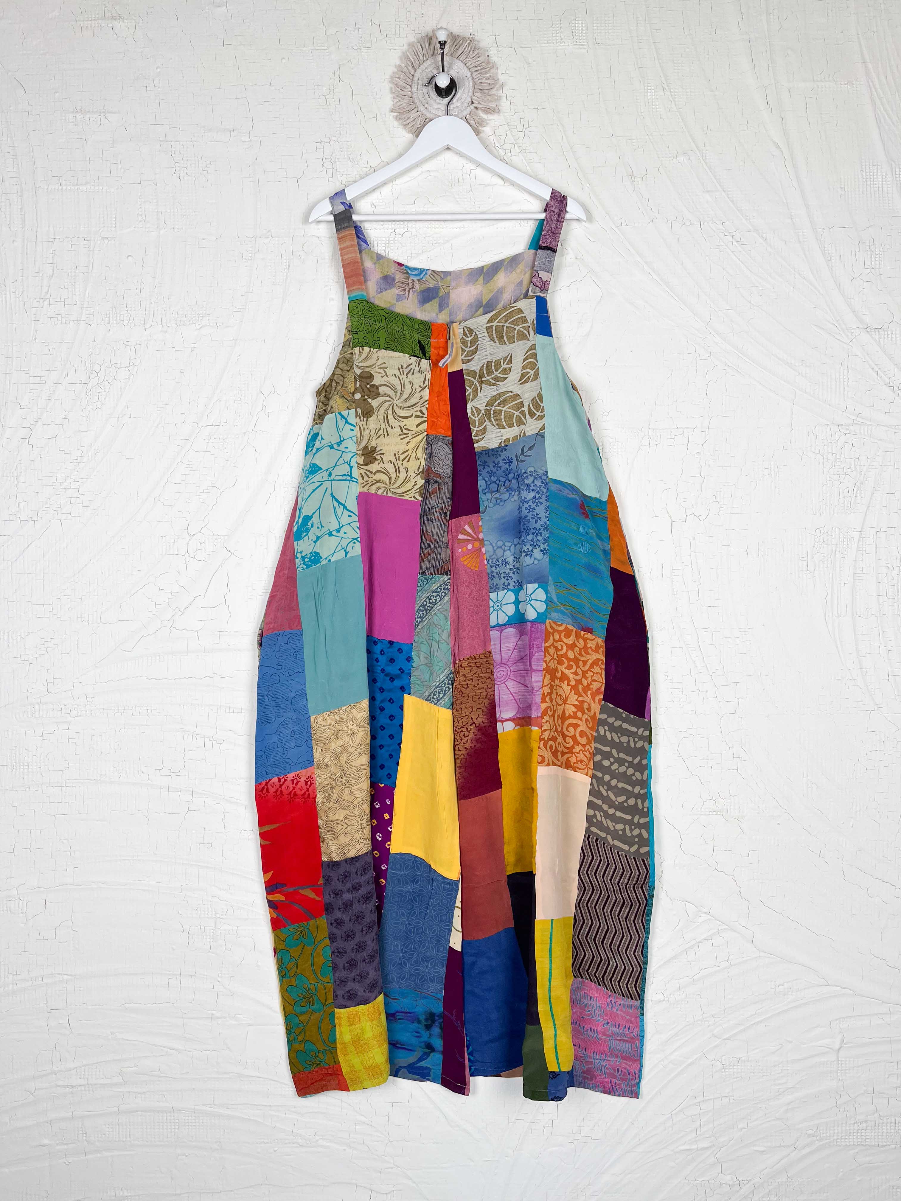 Colorful patchwork dress on a hanger - Love Protect Sustain