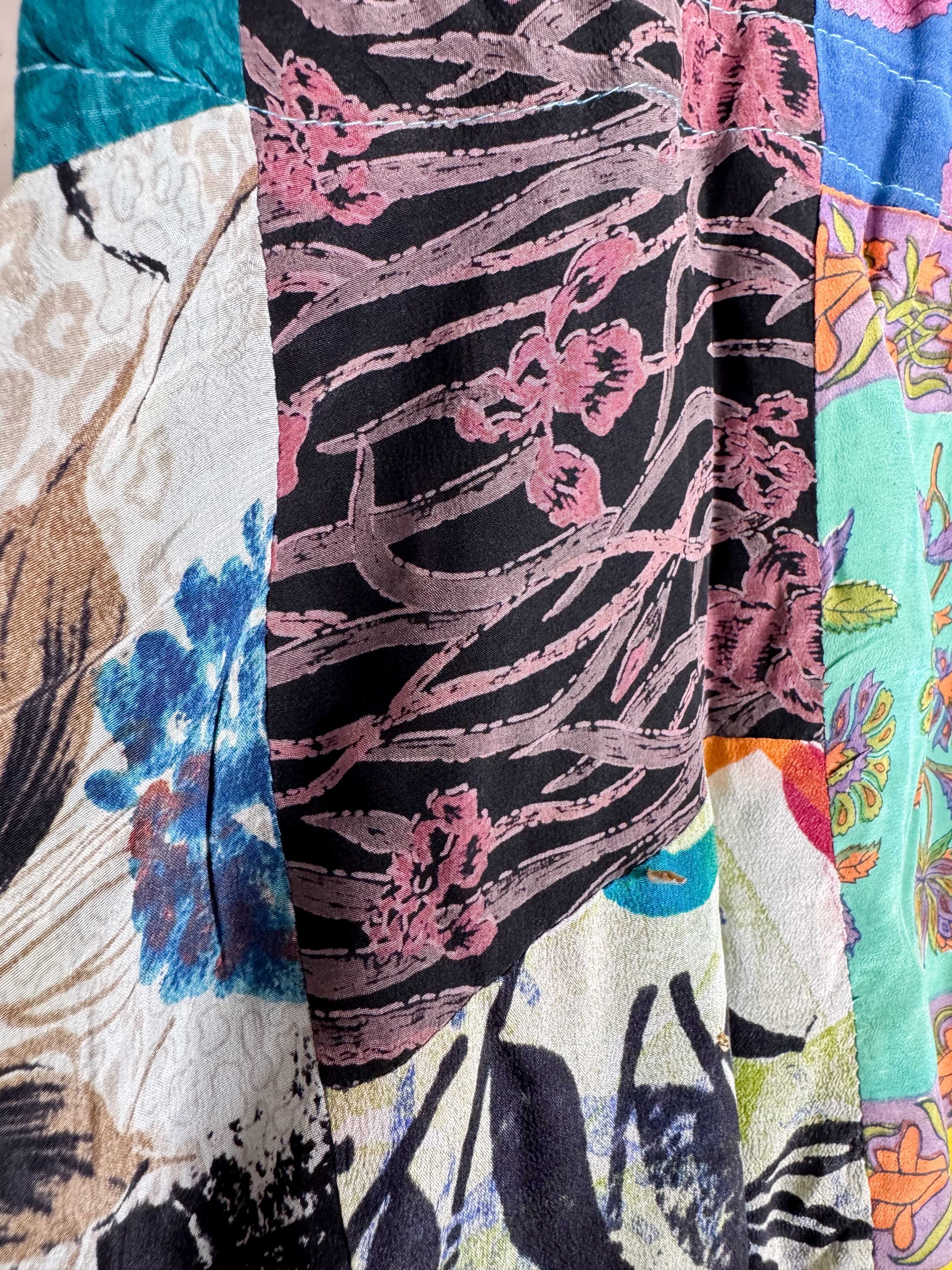 Close-up of a colorful patchwork - Love Protect Sustain